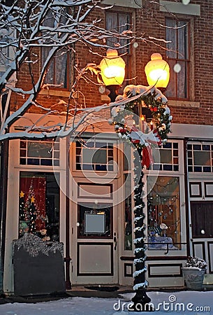 Small Town Main Street Christmas With Glowing Street Light Stock Photo