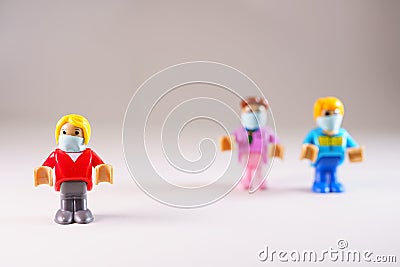 Small toy figure with face mask from group Editorial Stock Photo