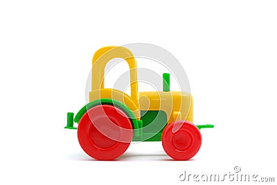 Small toy tractor isolated on white Stock Photo