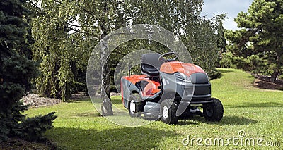 Small tractor for cutting lawn Stock Photo