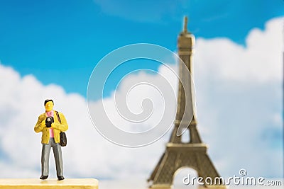 Small traveller figure for World Tourism Day background Stock Photo