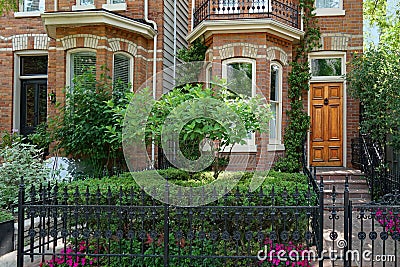 Small urban front garden typical of older neighborhoods Stock Photo