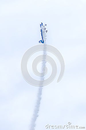 Small US Air Force Plane Flying Straight Up At 90 Degrees While Performing At An Air Show Editorial Stock Photo