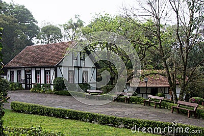 Small village with Germanic-style houses and benches to sit Editorial Stock Photo