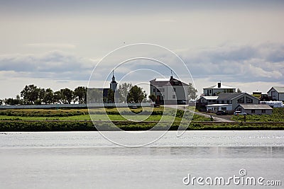 Small village at the shore of Myvatn lake, Iceland Stock Photo