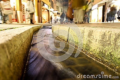 Small water ditch in freiburg Stock Photo