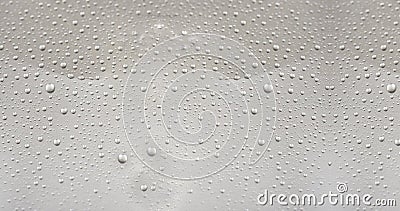 Small water droplets on a gray background closeup view Stock Photo