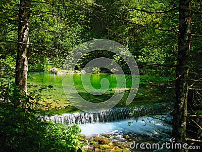 Small waterfall, green water Stock Photo