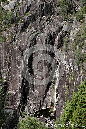 Small waterfall in Norwegian mountain. Stock Photo
