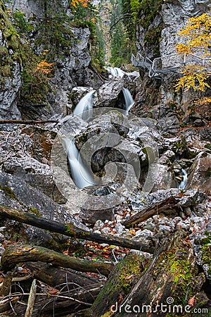 Small waterfall on the Pollat river in the Bavarian Alps Stock Photo