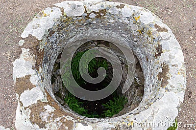 small well in an archeological site Stock Photo