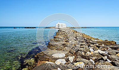 Small white church in sea near Georgioupolis town on Crete island Stock Photo