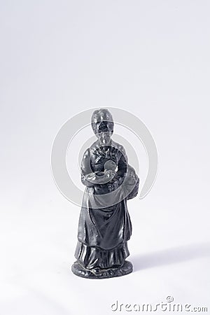 Coal figurine of an old woman. Stock Photo