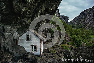 Small white, fishing house norway rock. Stock Photo