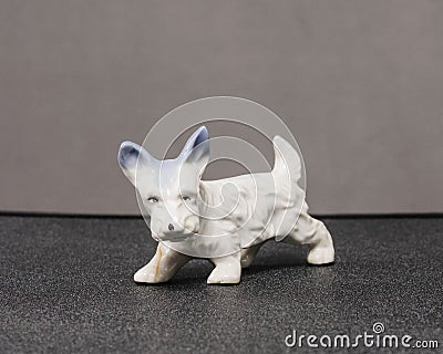 Small white Scottie dog sculpture of unknown origins Stock Photo