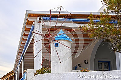 A small windmill in Cycladic style Stock Photo