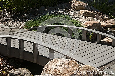 Small wooden bridge in park Stock Photo