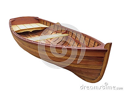 Small wooden dinghy isolated. Stock Photo