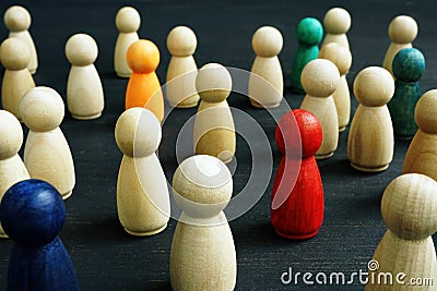 Small wooden figures. Social inclusion, diversity and equality. Stock Photo