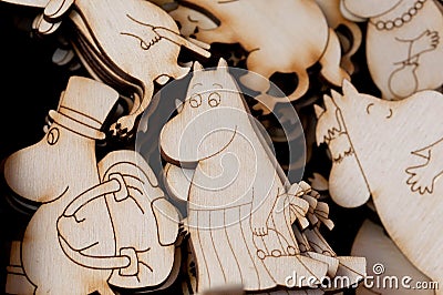 Small wooden images of the Moomims - Mumintroll - in selective focus Editorial Stock Photo