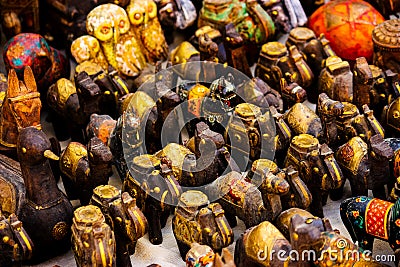 small wooden sculptures painted in gold of elephants in a shop in jaisalmer Stock Photo