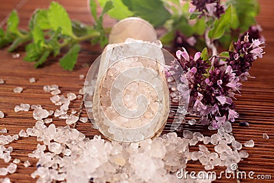 Small wooden shovel with bath salt Stock Photo