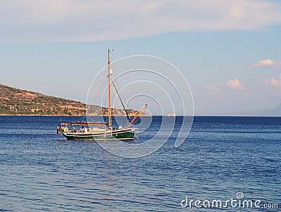 Small Yacht Moored in Bay Editorial Stock Photo