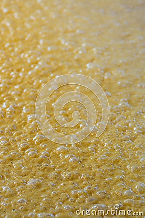 Small Yeast Bubbles of Yellow Bourbon Mash Stock Photo