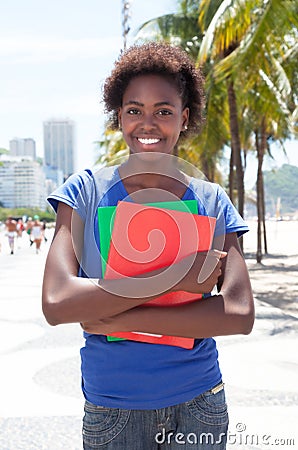 Smart african american student in the city Stock Photo