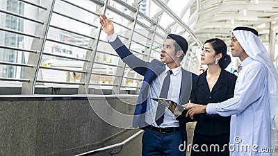 Smart asian arab business people man and woman worker talk Stock Photo