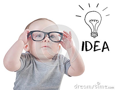 Smart baby with glasses has an idea Stock Photo