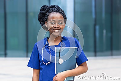 Smart black girl medical student, happy young african american woman doctor, nurse Stock Photo