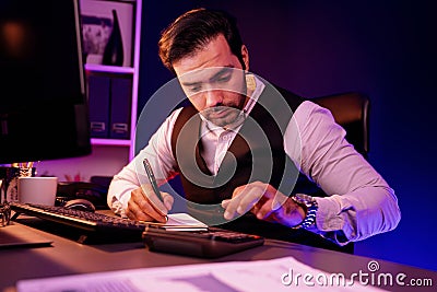 Smart businessman analyzing report folder, calculation profit or loss. Surmise. Stock Photo