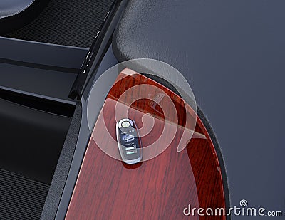 Smart car key on electric car`s dashboard Stock Photo