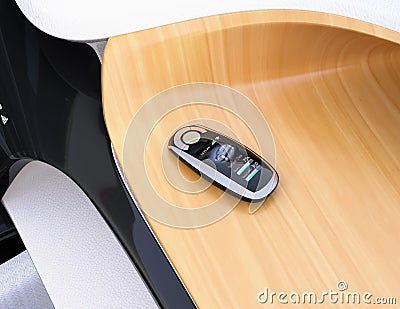 Smart car key on electric car`s dashboard Stock Photo