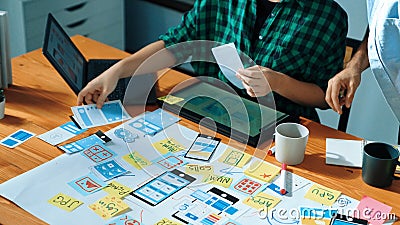Smart developer compare Ux Ui design and planning for development. Convocation. Stock Photo