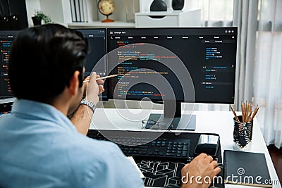 Smart IT developer pointing data software development lines on pc. Surmise. Stock Photo