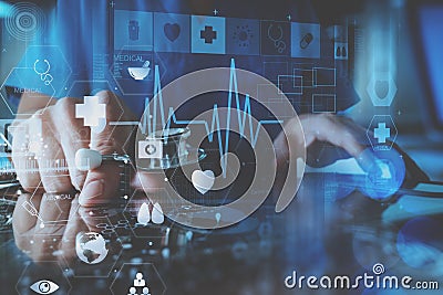 smart doctor hand working with modern laptop computer in modern Stock Photo