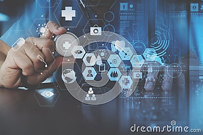 smart doctor hand working with modern laptop computer in modern Stock Photo