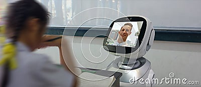Smart education industry futuristic concept, robotic assistant with artificial intelligence program in future use for teaching stu Stock Photo
