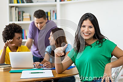 Smart female student with group of multi ehtnic students Stock Photo