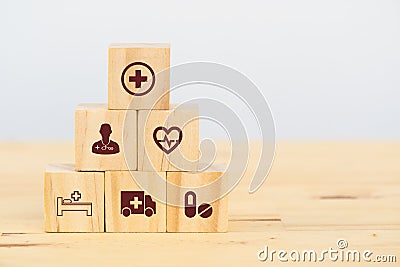 Smart health care, insurance concept, wooden cube symbolize insurance to protect or cover person, Property ,Liability, reliability Stock Photo