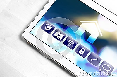 Smart home application in tablet to control house appliances. Stock Photo