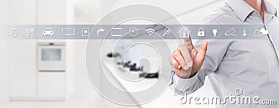 smart home automation control hand touch screen with white symbols on kitchen background web banner and copy space template Stock Photo