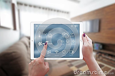 Smart home control on tablet. Stock Photo