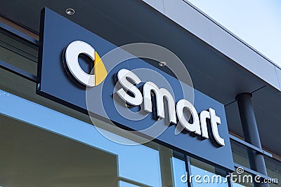 Smart logo on a car dealer building Editorial Stock Photo