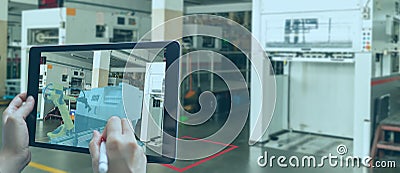 Smart manufacturing ,industry 4.0, 5.0 technology concept, man use augmented mixed virtual reality technology to manage and simult Stock Photo