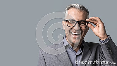 Smart businessman with glasses posing Stock Photo