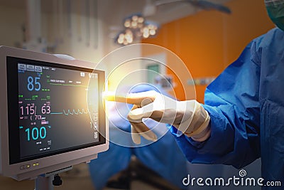 Smart medical technology in hospital concept, doctor in Surgeons team field holding medical instruments for surgery the patient in Stock Photo