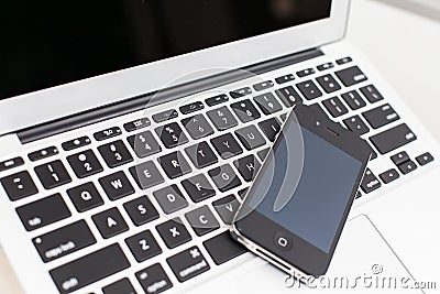 Smart phone and laptop Editorial Stock Photo